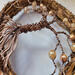 details wire wrapped tree trunk